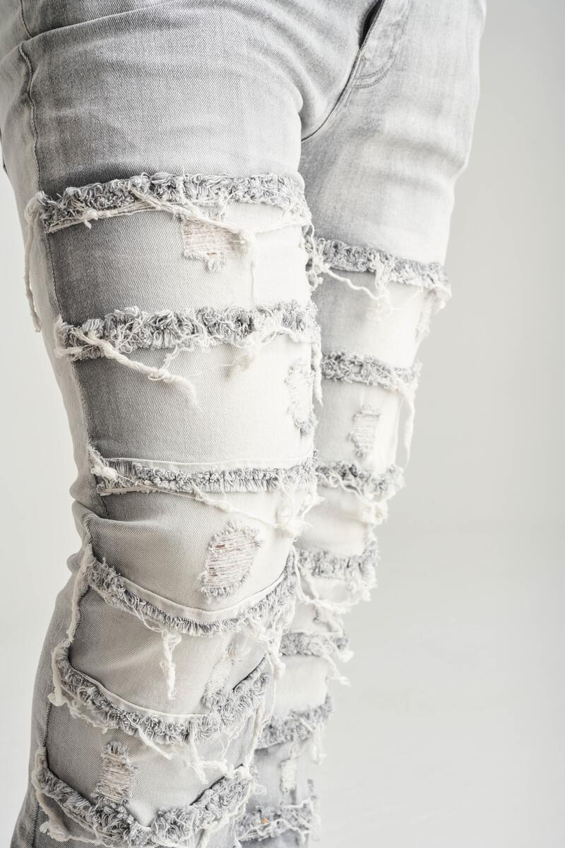 SK STRETCH STACK JEANS WITH FRAYED PATCH MULTI COLORS