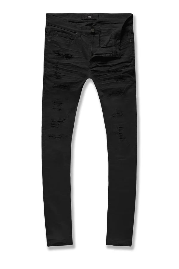 Black distressed skinny jeans with ripped details on the thighs and knees, shown flat against a white background.