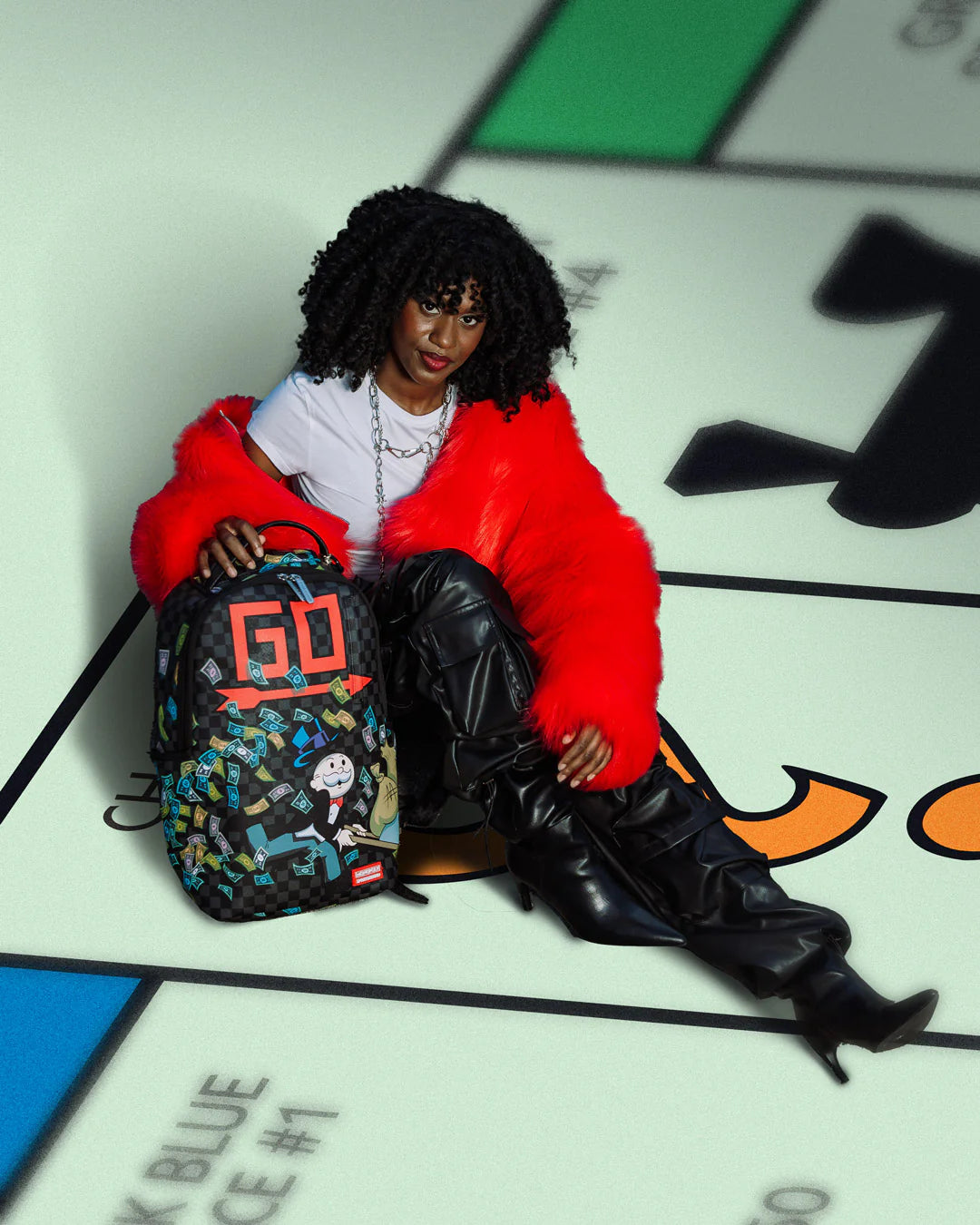 SPRAYGROUND MONOPOLY WHEEL BARREL BACKPACK