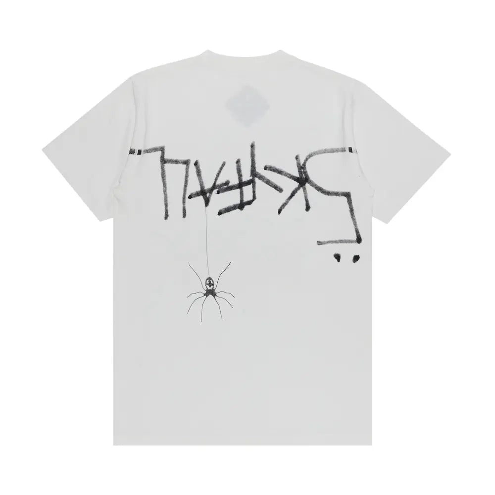 Casual streetwear look with minimal white graphic T-shirt