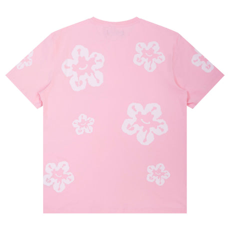 Close-Up of White Flower Print on Pink Tee