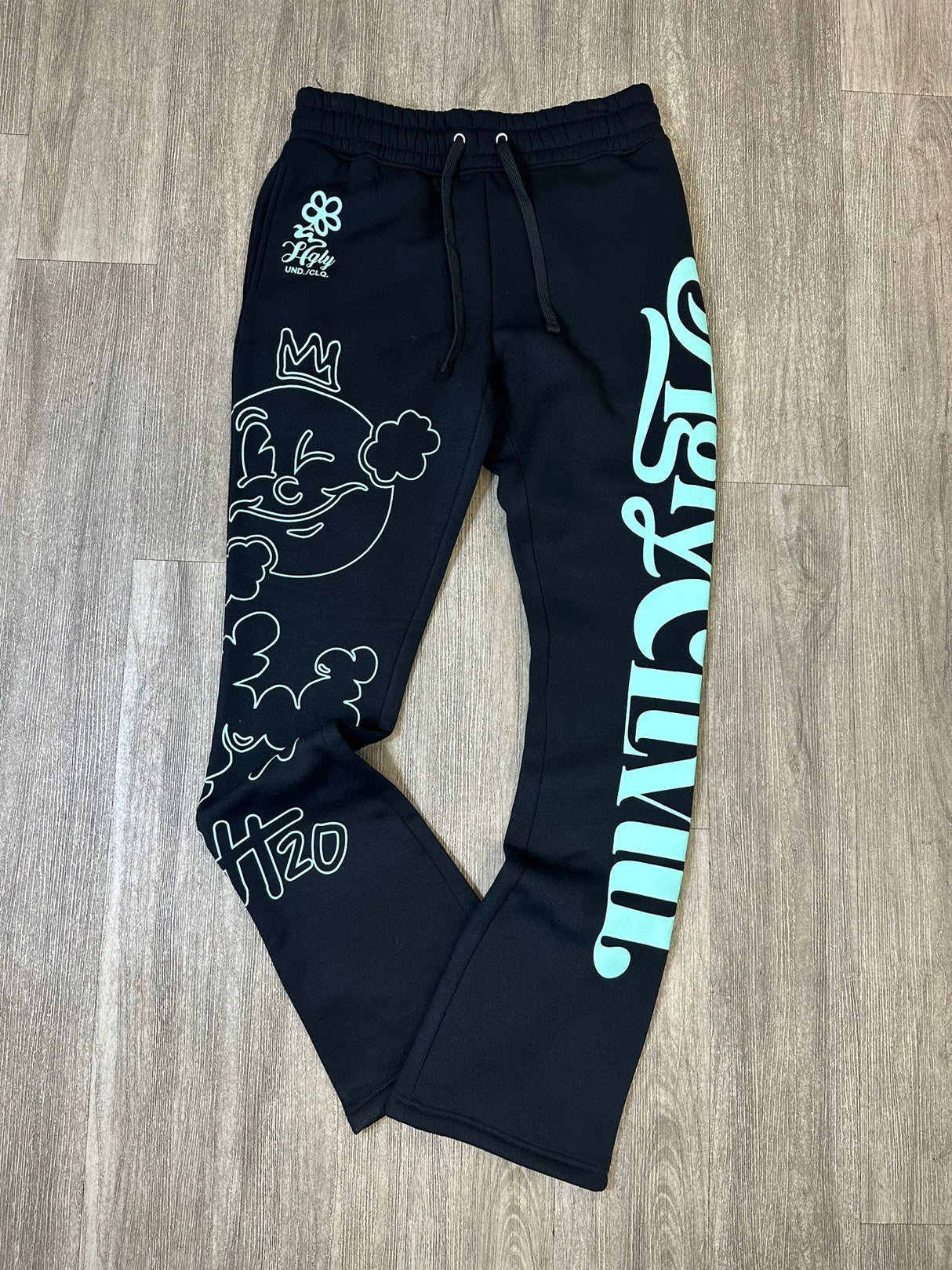 UNDRTD CLTVT BOTANICALS STACKED SWEATPANTS