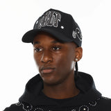 CULT OF INDIVIDUALITY 5 PANEL FRAME TRUCKER HAT IN BLACK