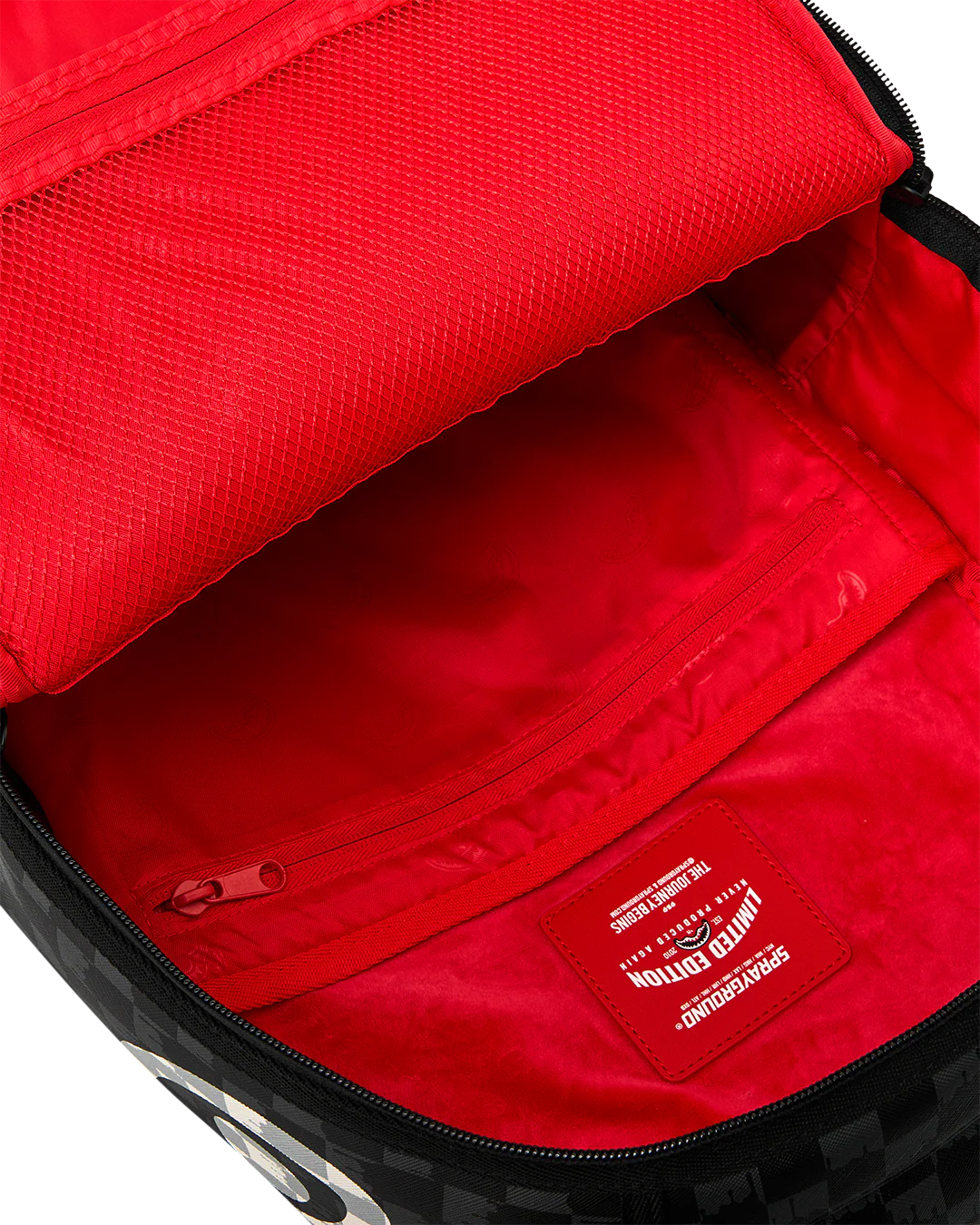 SprayGround Black And White Drip Check Dlxsv Backpack