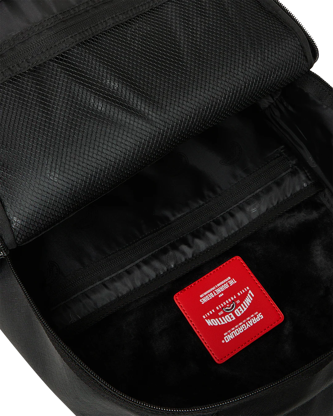 SprayGround Blacked Out Embossed Gold Tooth Dlxsv Backpack