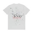 Streetwear outfit with white graphic T-shirt inspired by Travis style