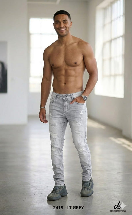 Casual streetwear look with rip and repair style jeans