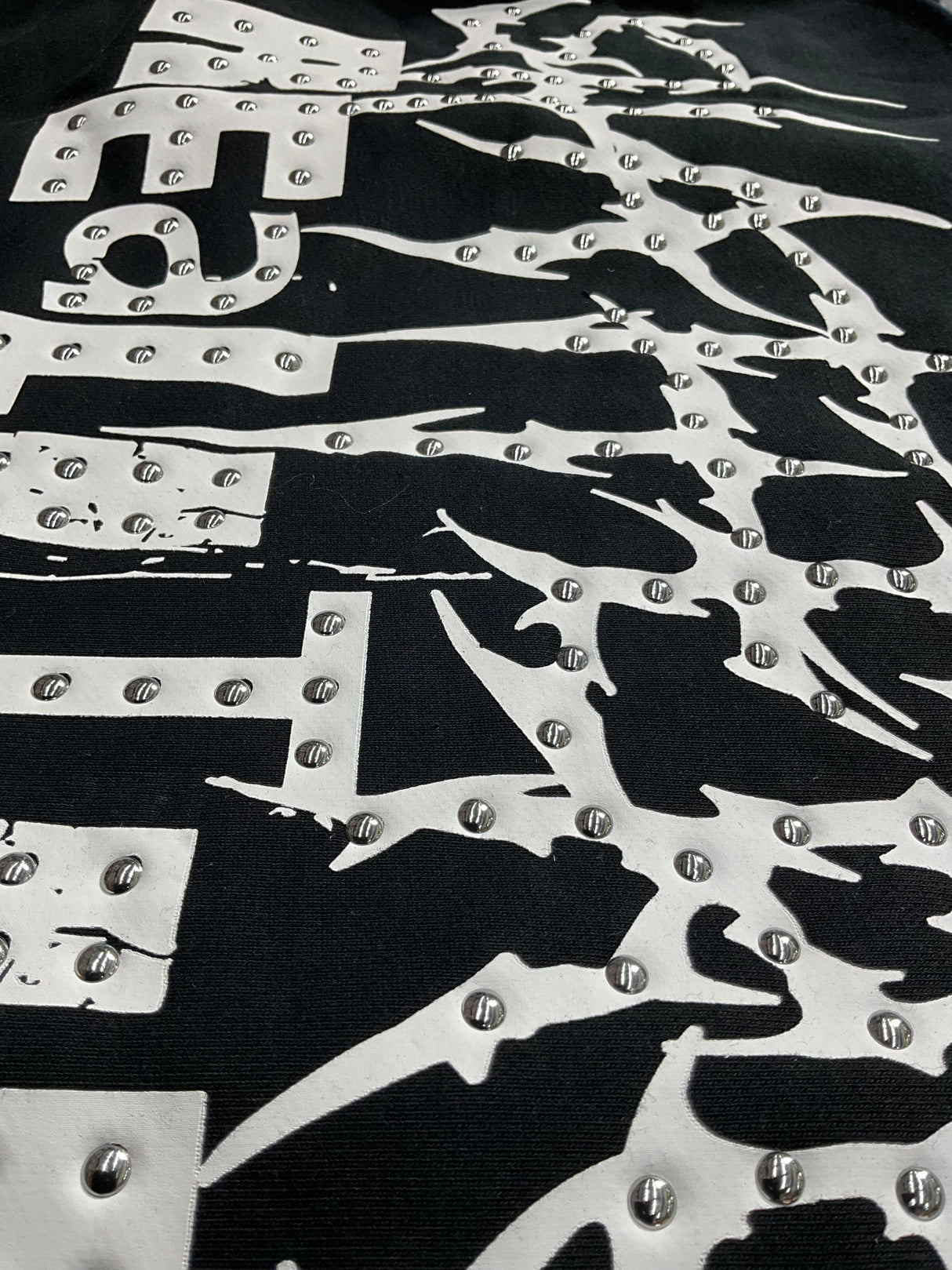 Urban outfit featuring an edgy black graphic T-shirt