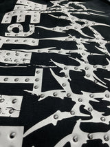 Urban outfit featuring an edgy black graphic T-shirt