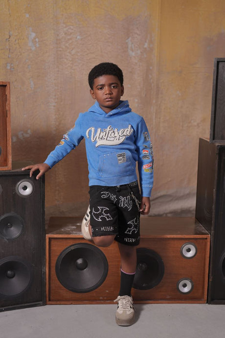 Elite Kids Faith rhinestone chain baggy shorts detail view