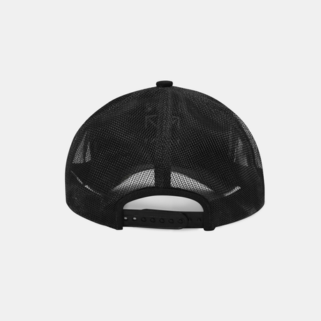 Black mesh trucker cap viewed from the back, featuring a black adjustable snapback closure and a black button on top, set against a light gray background.
