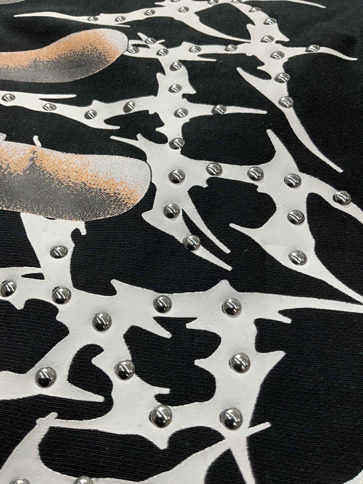 Modern streetwear look with a statement rhinestone T-shirt