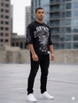 close up of rhinestone detailing on Undrtd Saint Club Global 3/4 sleeve tee