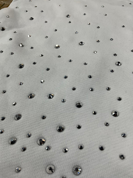 model wearing Undrtd Through the Smoke rhinestone 3/4 sleeve t-shirt styled in urban streetwear outfit